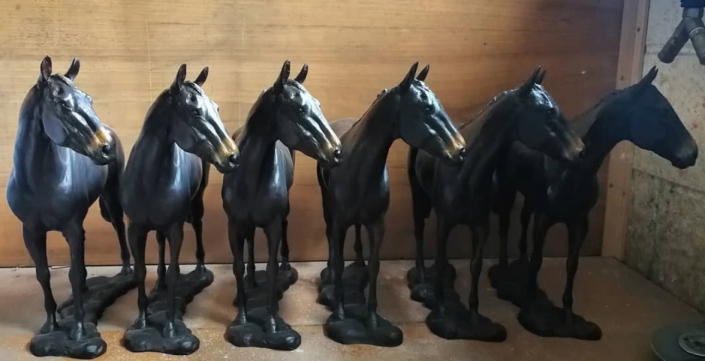 'Many Clouds' by artist Caroline Wallace ready for their bases - 6 identical bronze horses