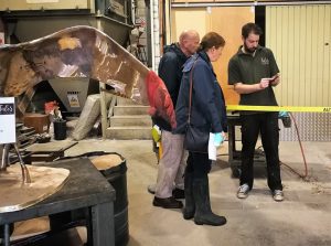 Talos team member Pat talking to visitors about a recent restoration project after a patination demonstration