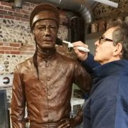 Wax being applied to Lester by artist William Newton