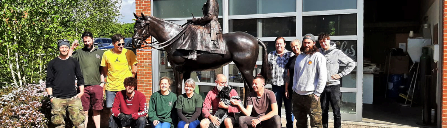 Talos foundry staff with sculpture of the Queen by Caroline Wallace