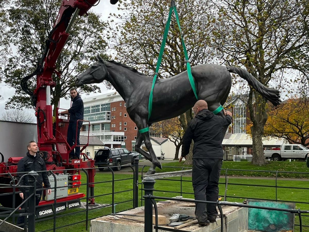 Philip Blacker's Red Rum is hoisted onto the lorry goes in for repairs