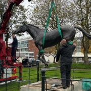 Philip Blacker's Red Rum is hoisted onto the lorry goes in for repairs